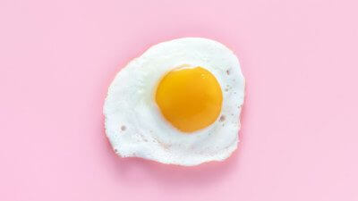 Egg on pink background
